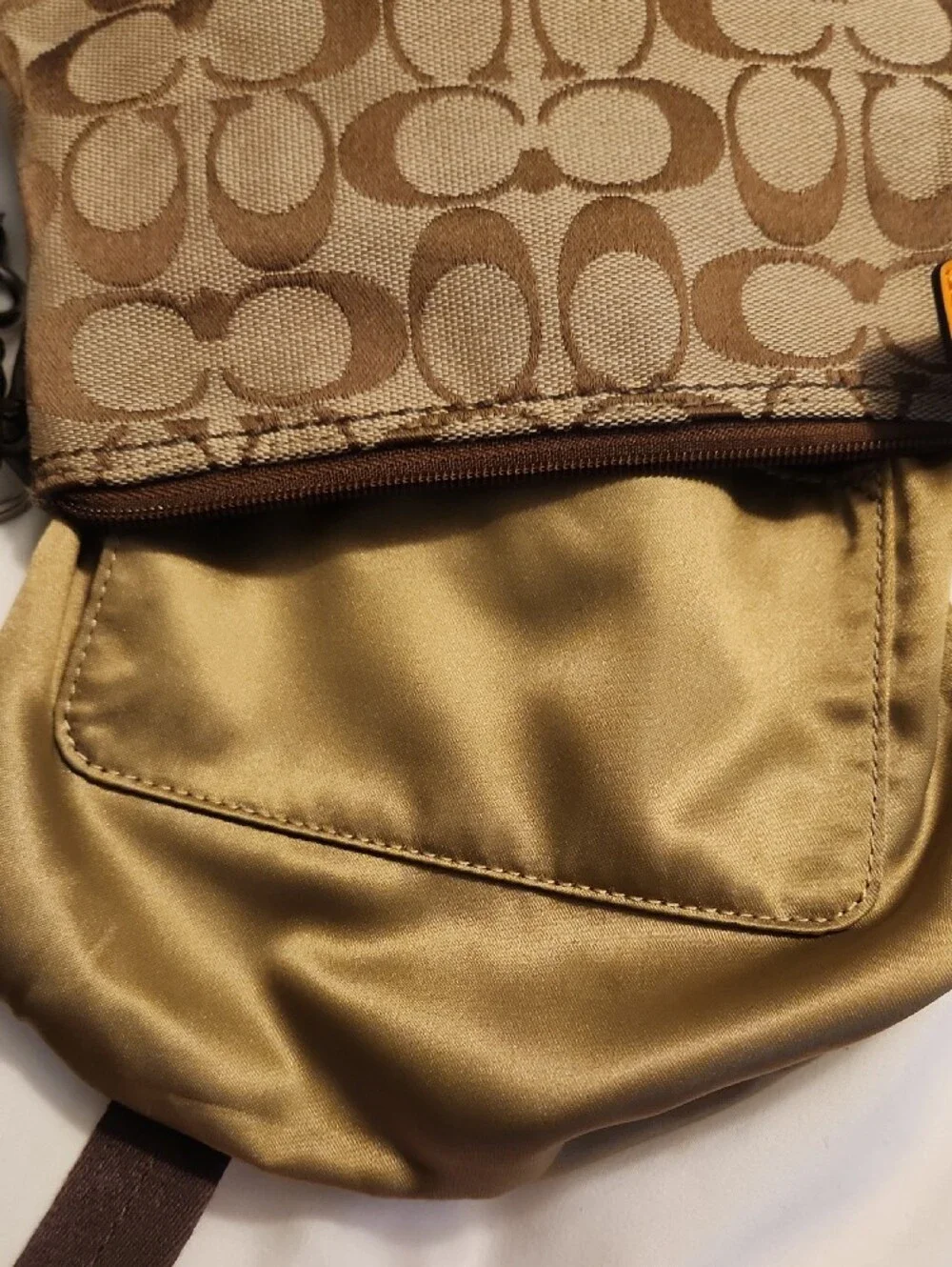 brown Coach Signature Jacquard crossbody bag